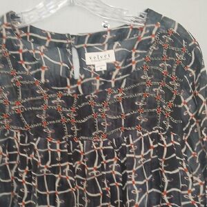 Velvet Black and White Blouse with Red Accents